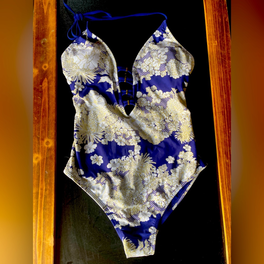 Navy blue with white floral print one piece size medium swim suit never worn